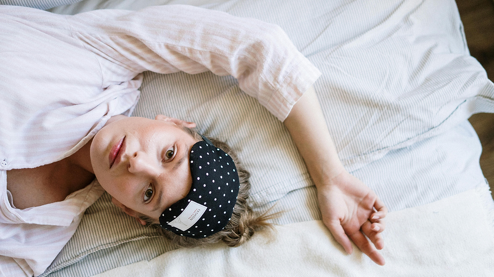 Woman Waking Up With Night Sweats During Period