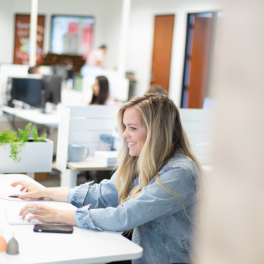 female working at her office desk
