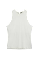 The Best Travel Top. Flat Lay of the Cami Wrinkle Free Travel Tank in White.