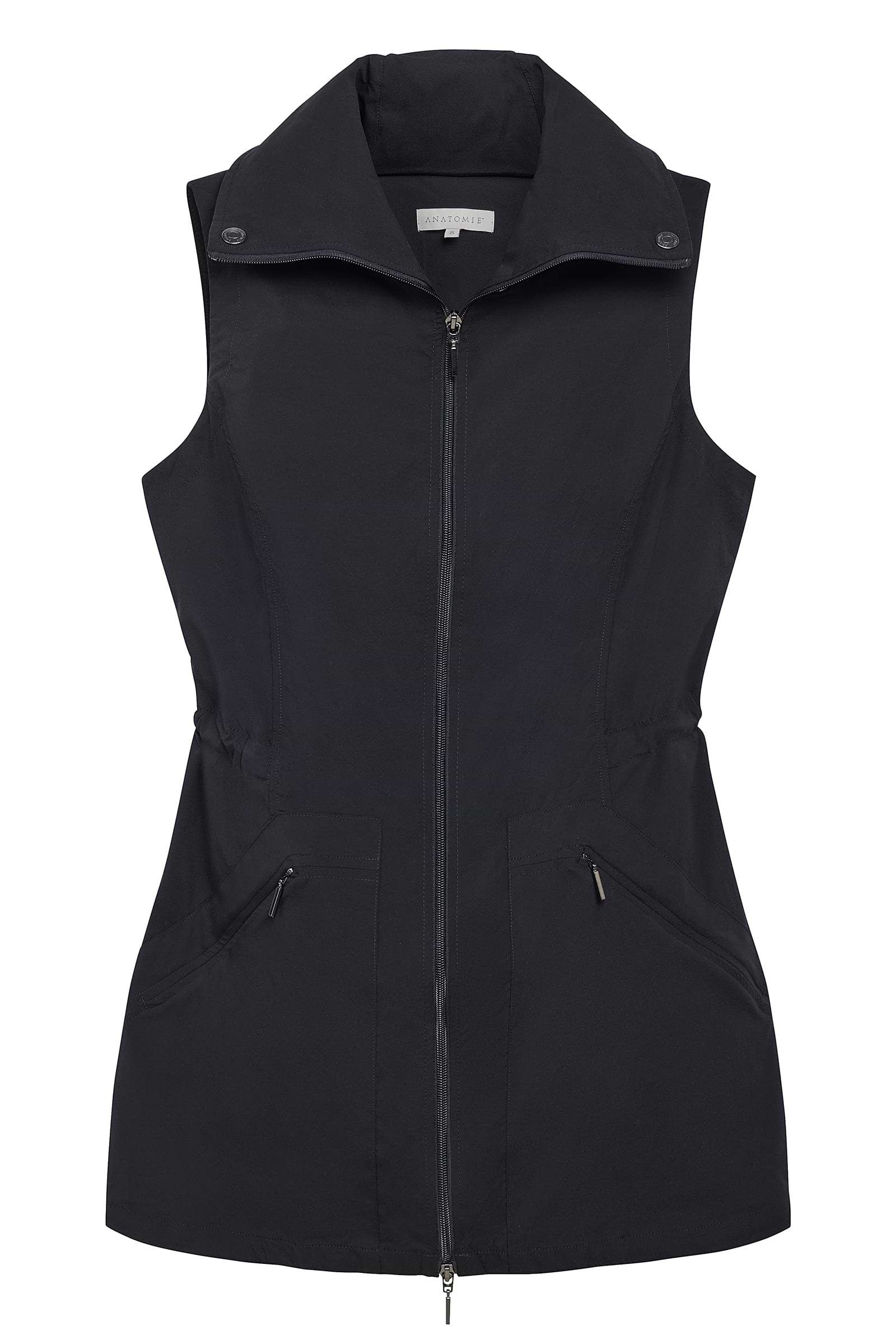 The Best Travel Vest. Flat Lay of a Delaney Travel Vest in Black.