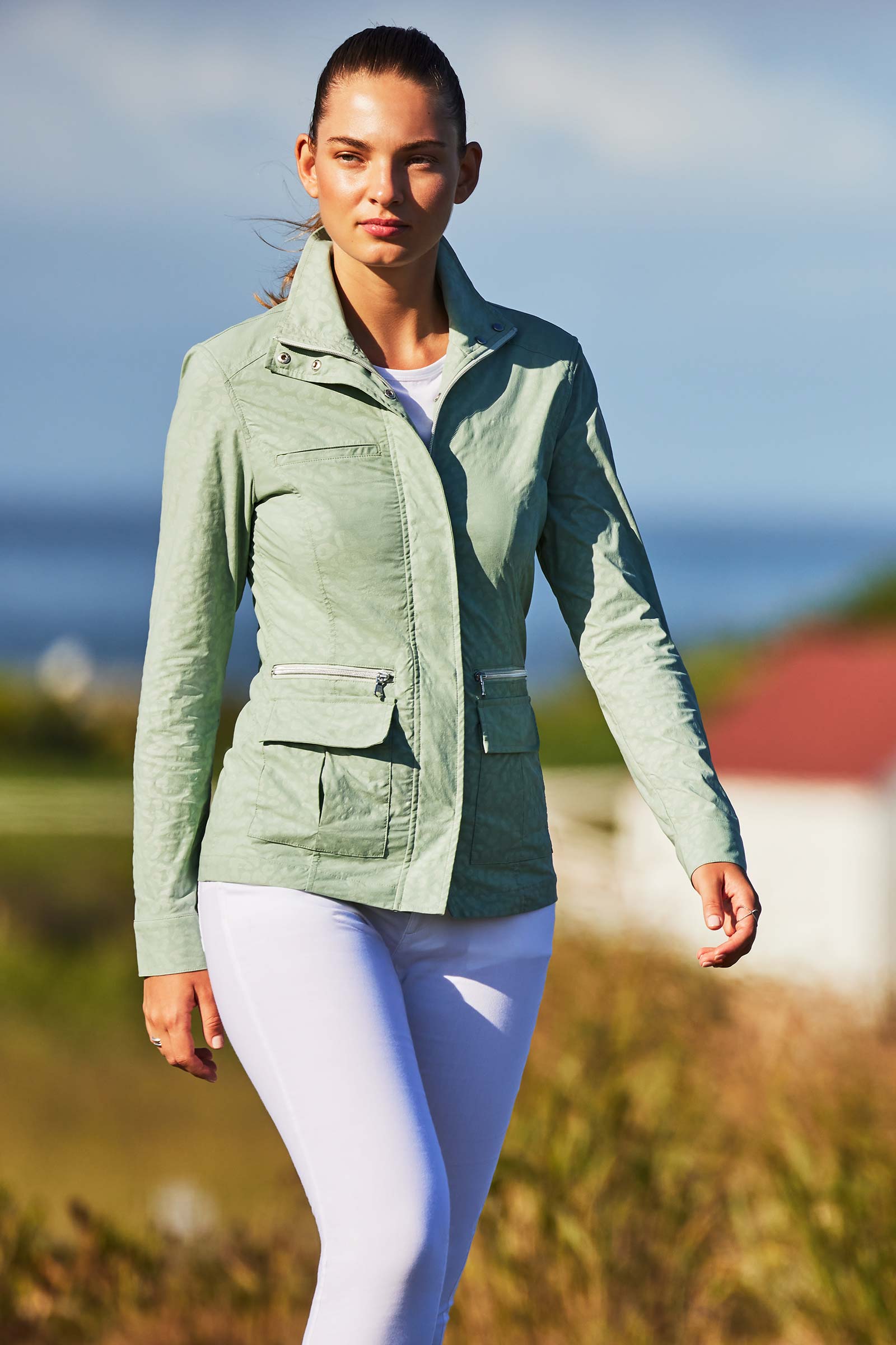 The Best Travel Jacket. Lifestyle Image of the Embossed Kenya Jacket in Cheetah Sage.