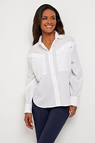 The Best Travel Top. Woman Showing the Front Profile of a Kieran Top in White.