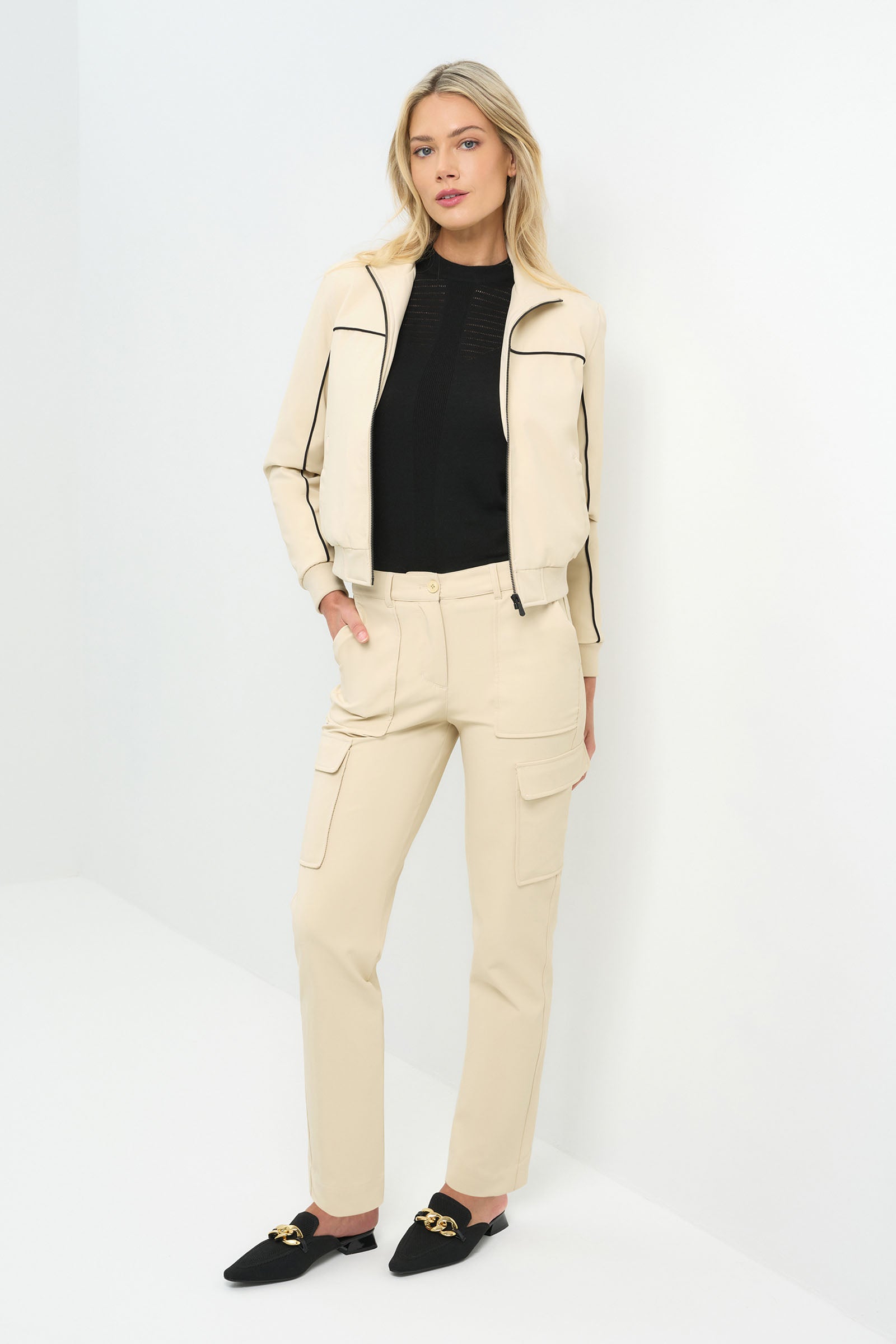 Font view of cream bomber jacket with black pinstripe detailing