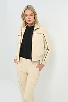 Front view of cream bomber jacket with black pinstripe detailing unzipped