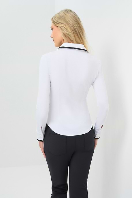 Back view white long-sleeve zip-front blouse featuring a contrasting black trim along the collar, zipper placket, and cuffs.