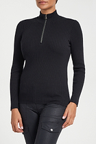 The Best Travel Sweater. Woman Showing the Front Profile of a Stacey Sweater in Black.