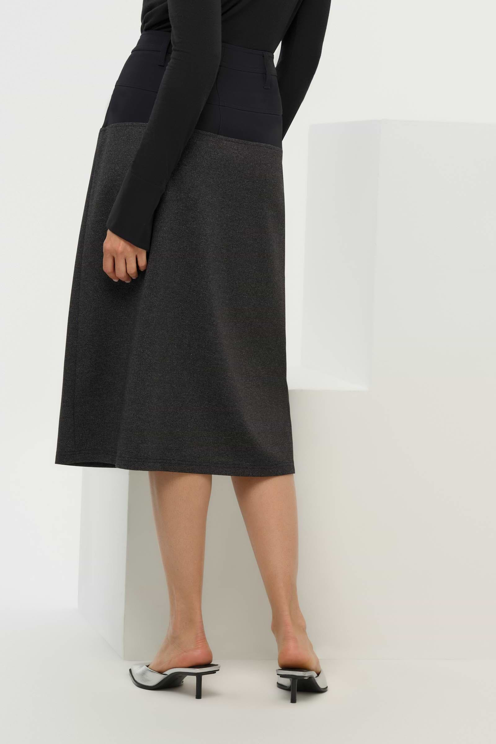 Angle view of the Zita Ponte Midi Skirt showing the clean lines and stretch ponte material.