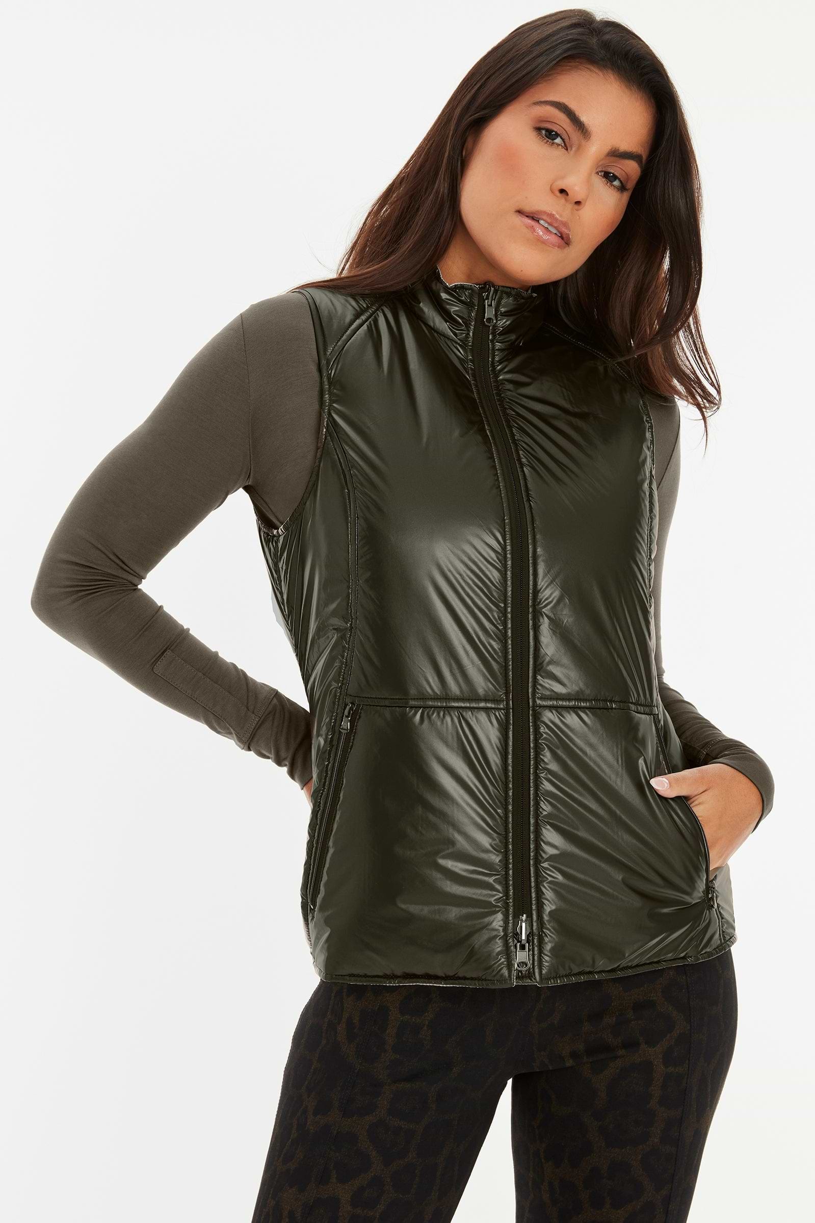 army-green-black||||2021_09_16_March_Catalog_Editorial_Vertical_PDP_Cheetah_Kenya_and_Aida_Suit.mp4