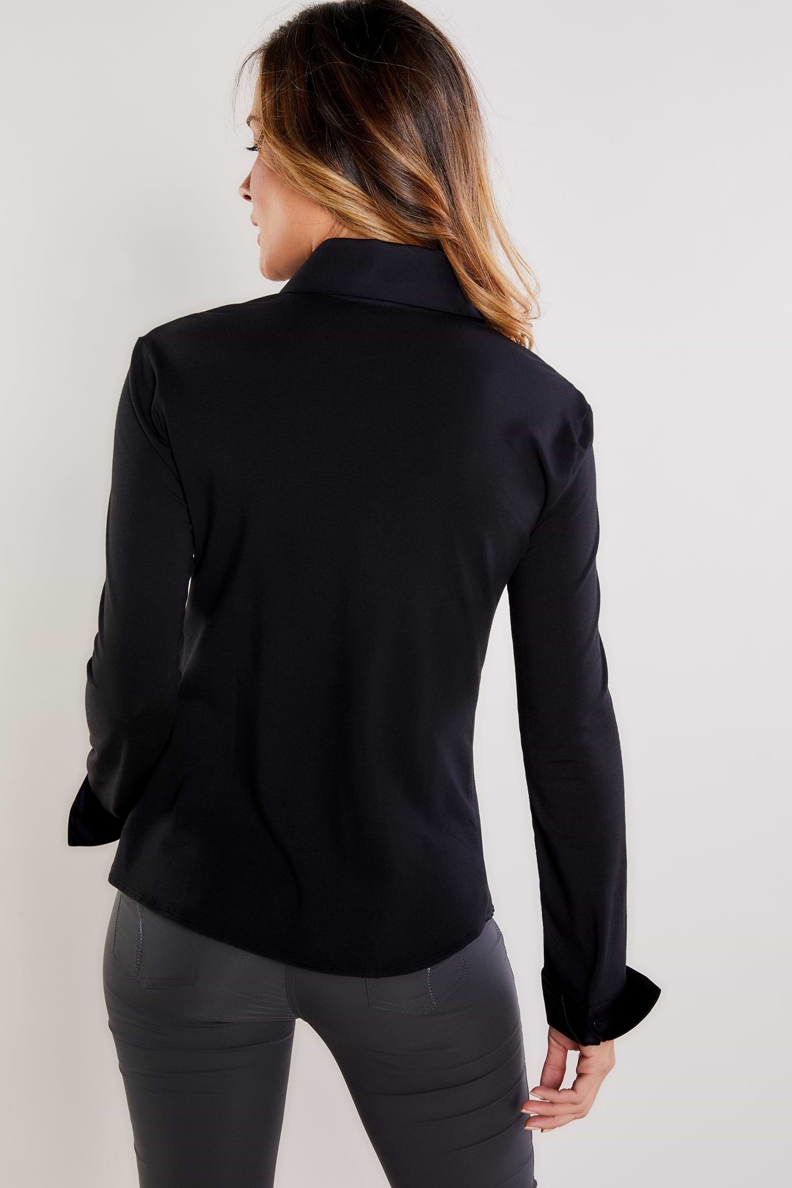 The Best Travel Shirt. Woman Showing the Front Profile of a Alida Button Down Poplin Shirt in Black