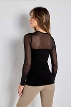 The Best Travel Shirt. Woman Showing the Back Profile of a Budah Mesh Pima Cotton Shirt in Black