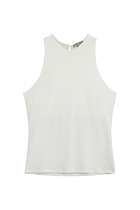 The Best Travel Top. Flat Lay of the Cami Wrinkle Free Travel Tank in White.