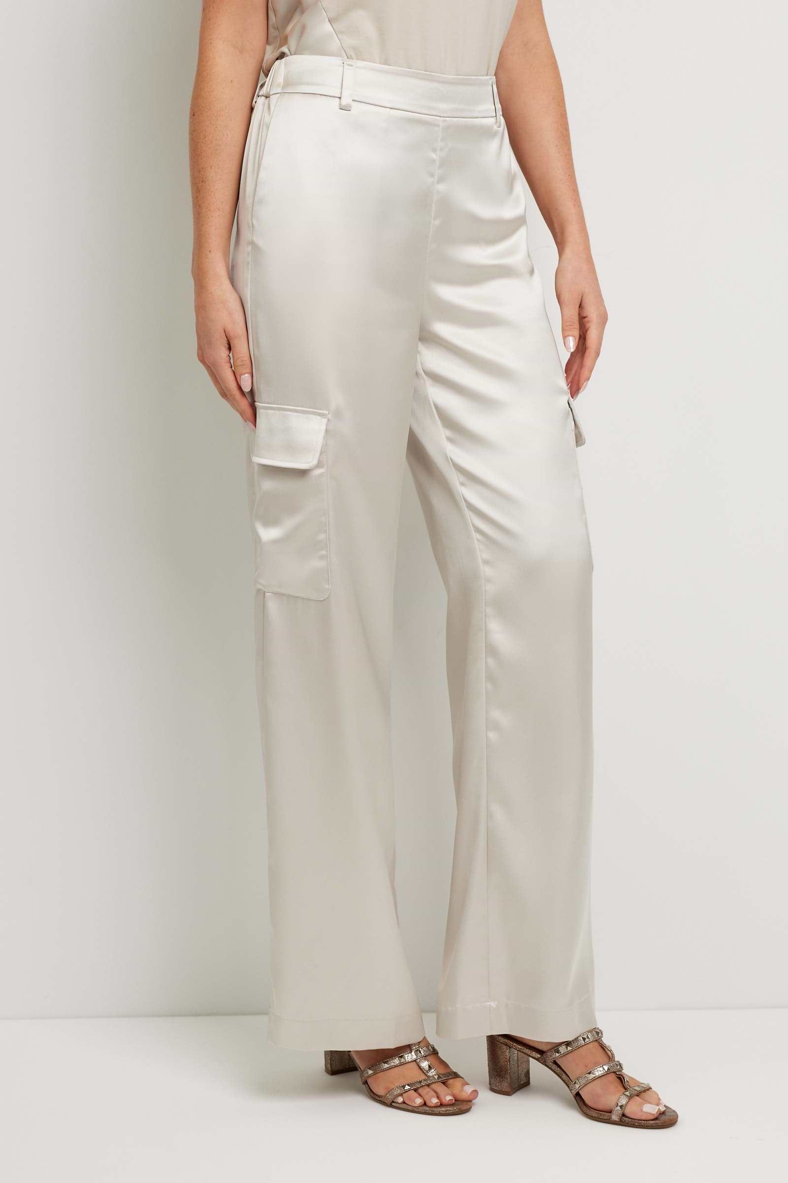 The Best Travel Pant. Side Profile of a Candela Satin Pant in Stone.