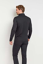 The Best Travel Top. Man Showing the Back Profile of a Men's Charlie Top in Black.