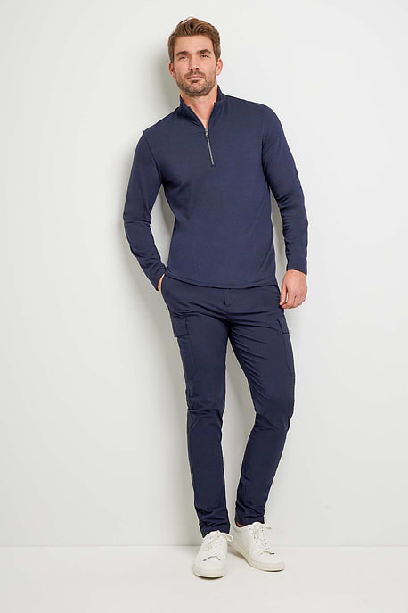 The Best Travel Top. Man Showing the Front Profile of a Men's Charlie Top in Navy.