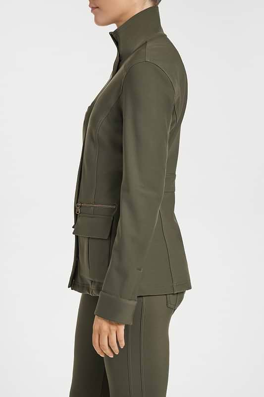The Best Travel Fleece-Lined Jacket. Woman Showing the Side Profile of a Kenya Cozy Fleece-Lined Jacket in Army Green