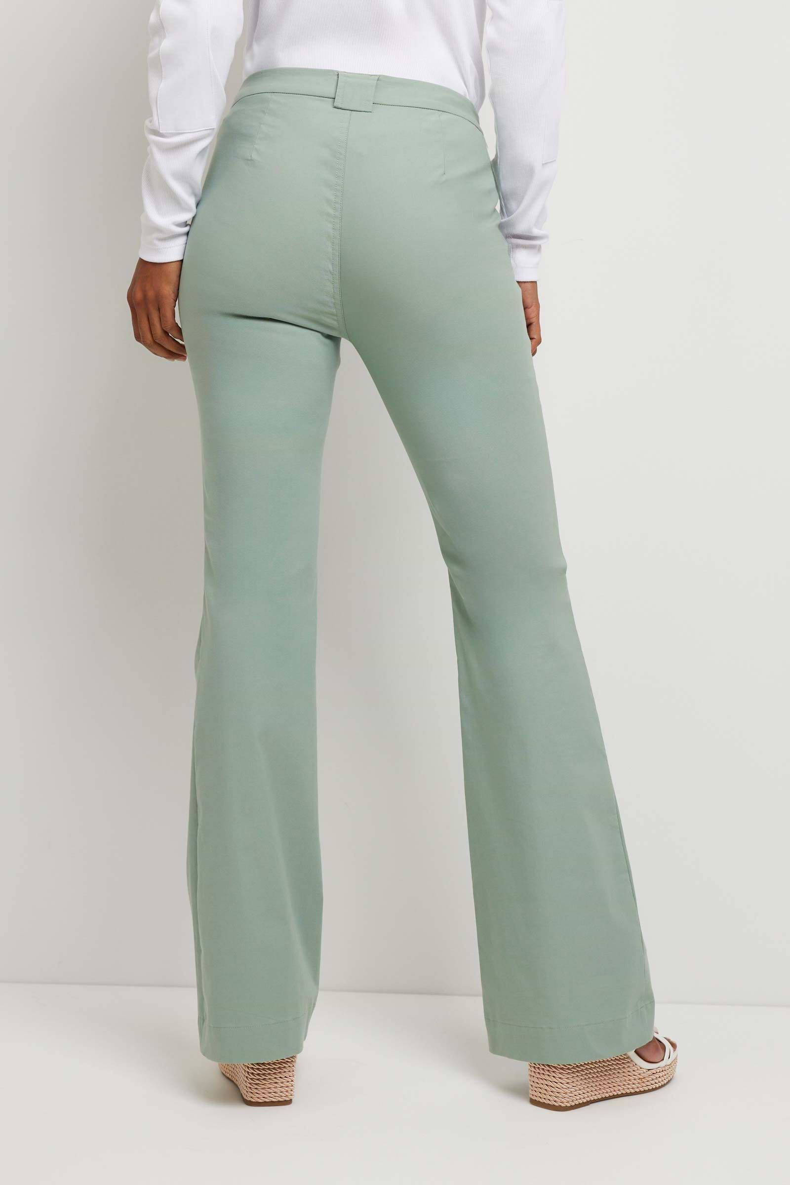 The Best Travel Pant. Back Profile of a Darby Pant in Sage.