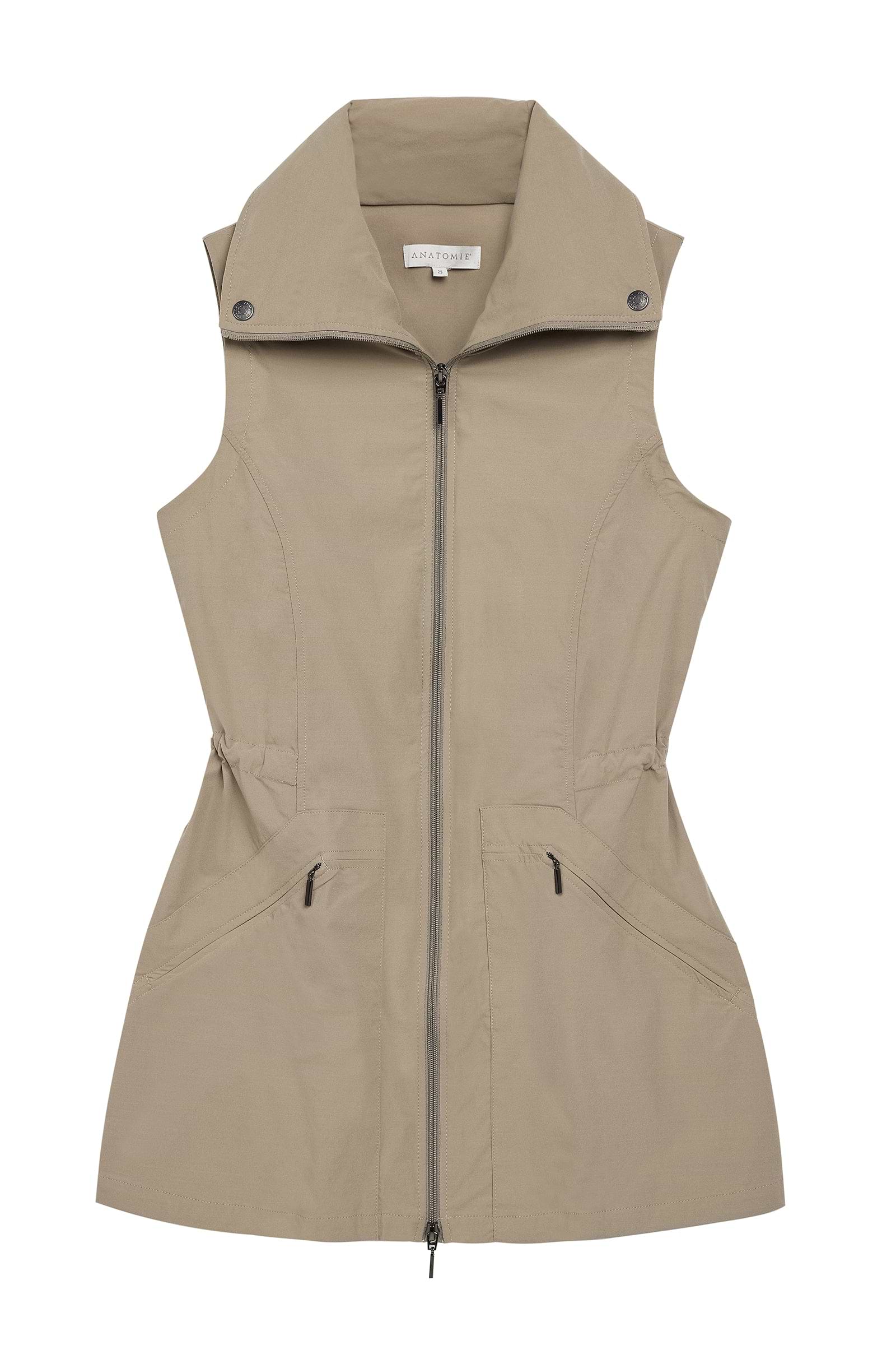 The Best Travel Vest. Flat Lay of a Delaney Travel Vest in Khaki