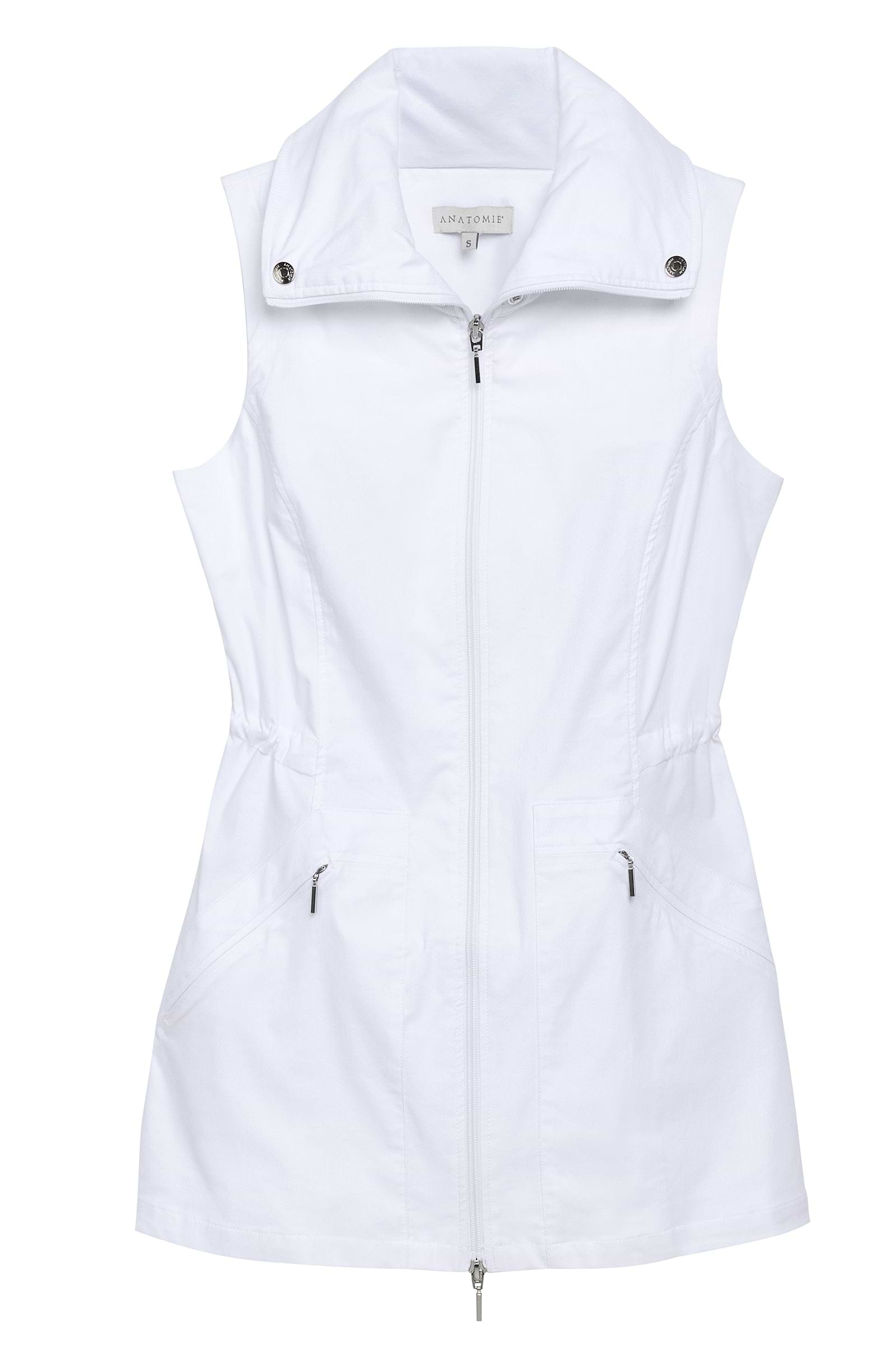 The Best Travel Vest. Flat Lay of a Delaney Travel Vest in White