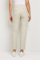 The Best Travel Pants. Woman Showing the Back Profile of a Gemma Pant in Champagne.