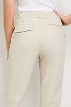 The Best Travel Pants. Back Pocket Details of a Gemma Pant in Champagne.