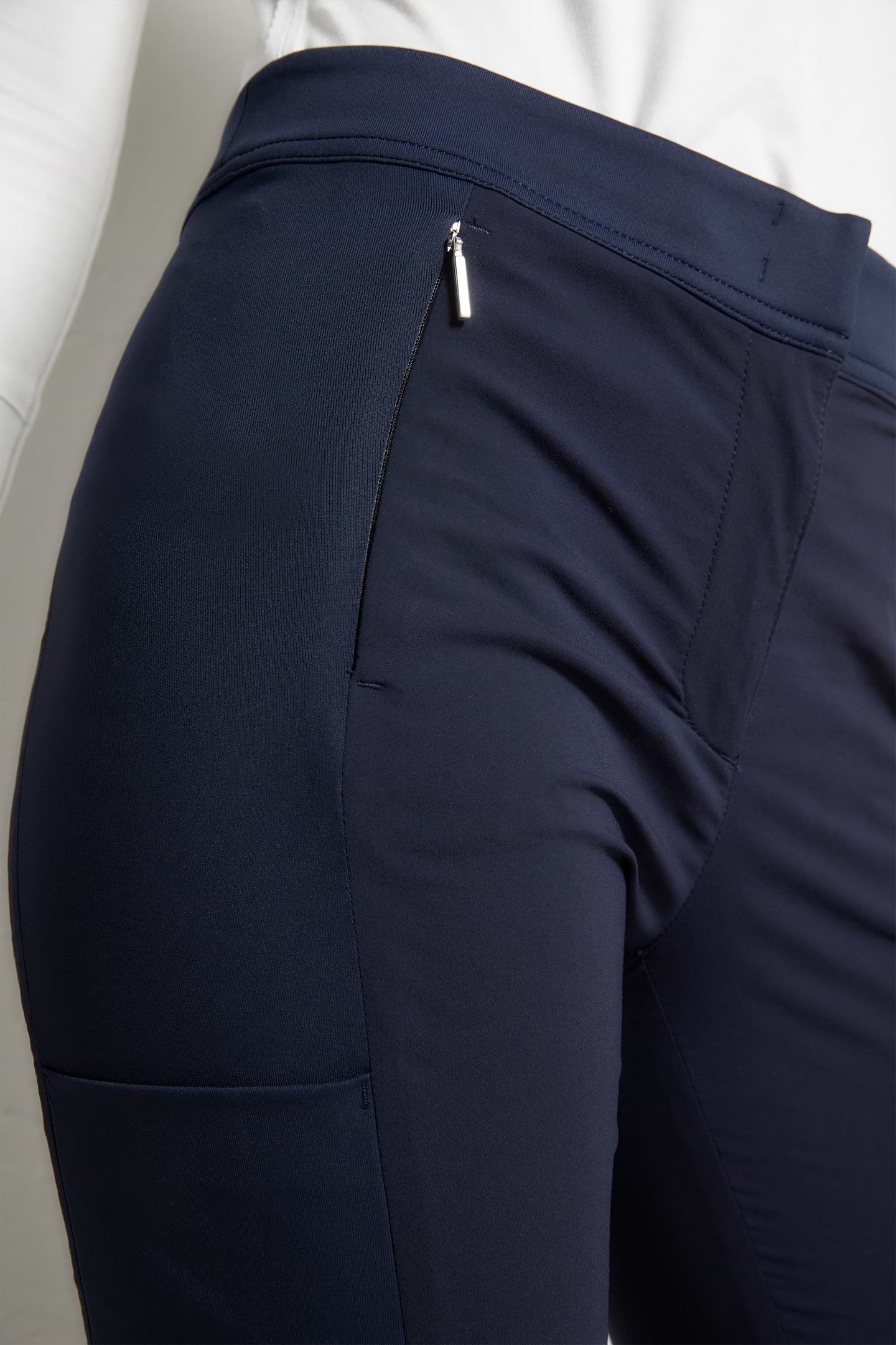 The Best Travel Pants. Front Zipper Pocket of the Ipant Hybrid Zip Front Slim Fit Pant in Navy