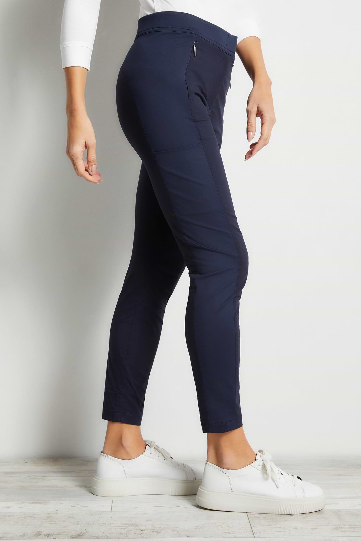 The Best Travel Pants. Side Profile of the Ipant Hybrid Zip Front Slim Fit Pant in Navy