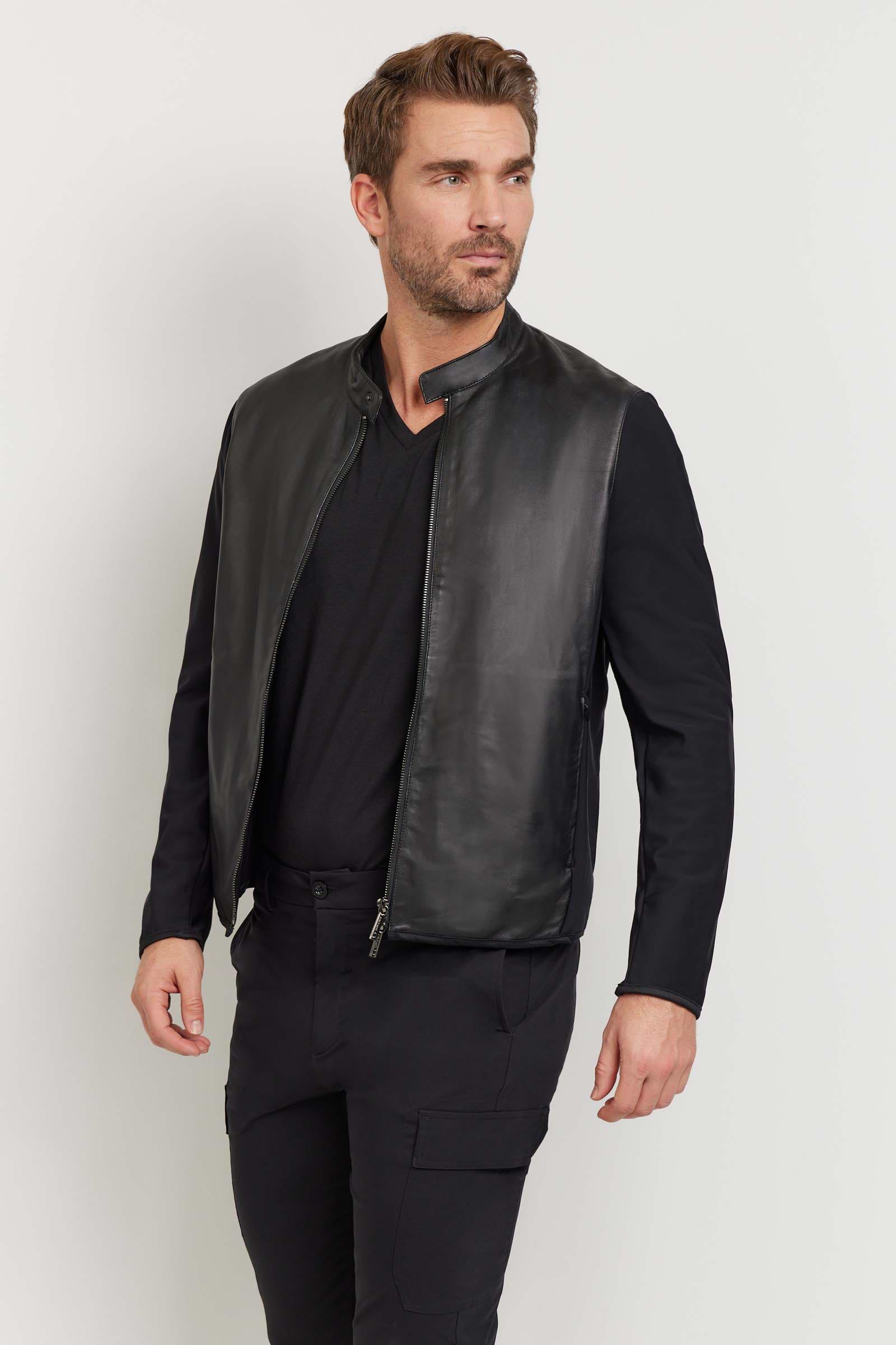 The Best Travel Jacket. Man Showing the Side Profile of a Men's Joey Leather Jacket in Black.