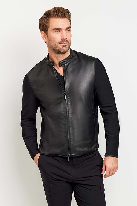 The Best Travel Jacket. Man Showing the Front Profile of a Men's Joey Leather Jacket in Black.