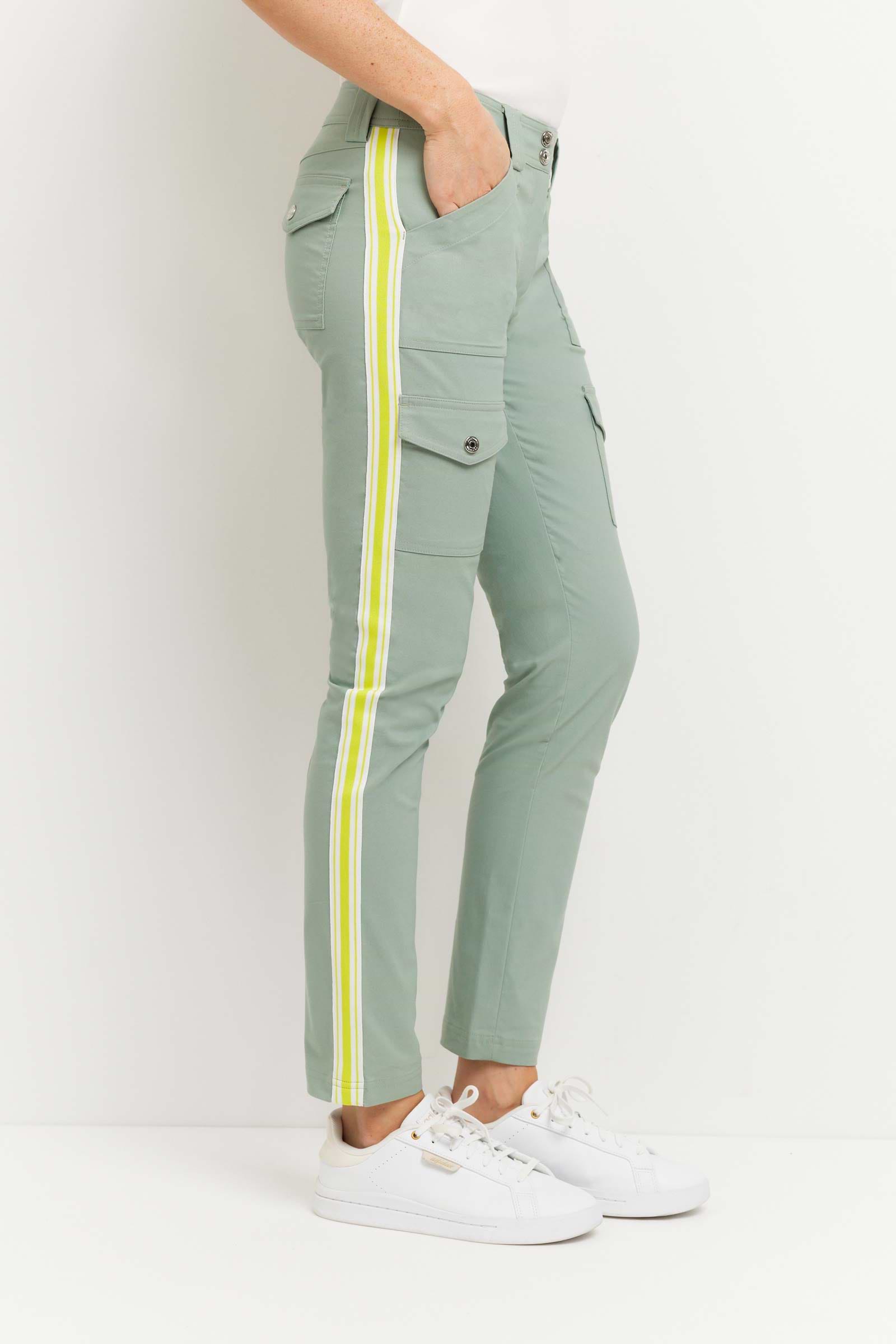 The Best Travel Pants. Woman Showing the Side Profile of a Kate Stripe Pants in Sage.