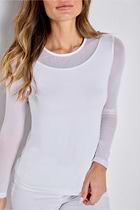 The Best Travel Top. Woman Showing the Front Profile of a Kim Mesh-Sleeve Top in Pima Modal in White.