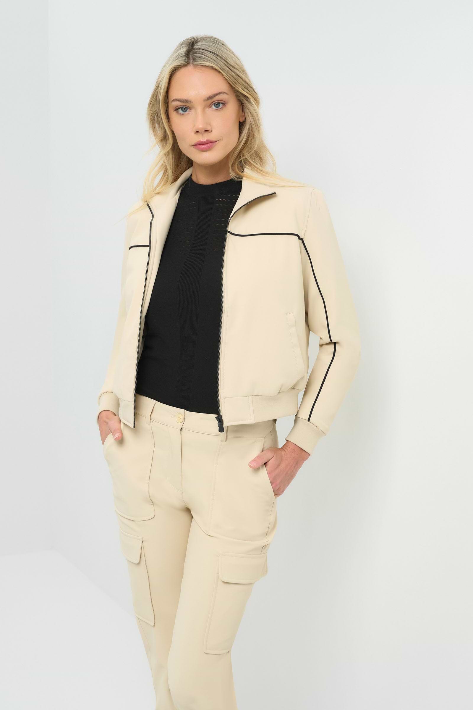 Front view of cream bomber jacket with black pinstripe detailing unzipped