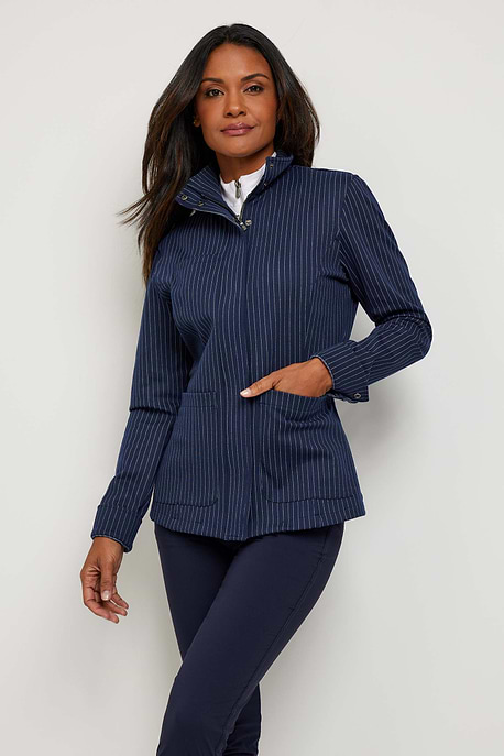 The Best Travel Jacket. Woman Showing the Front Profile of an Lucia Jacket in Navy/White.