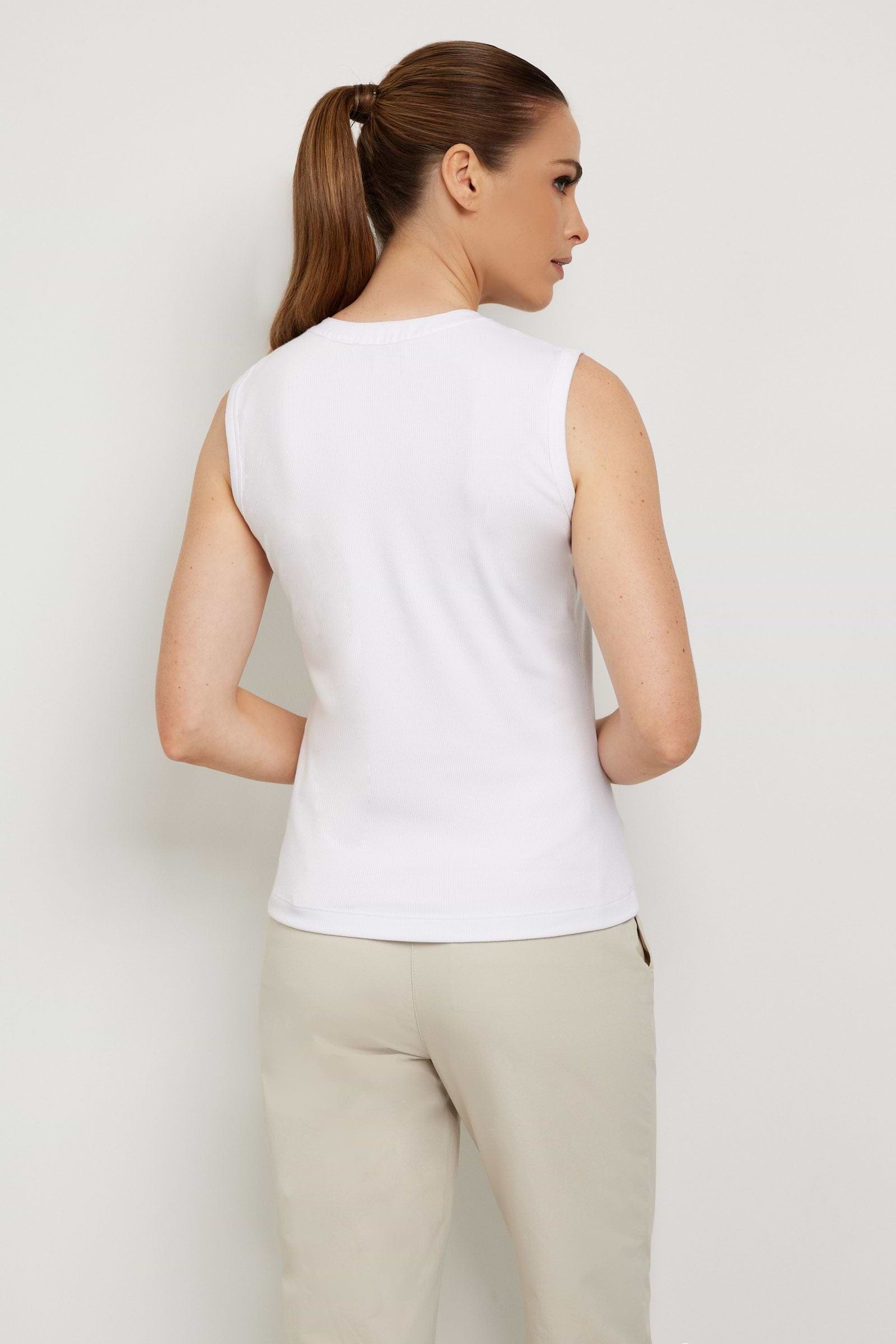 The Best Travel Top. Woman Showing the Back Profile of a Madelyn Top in White.