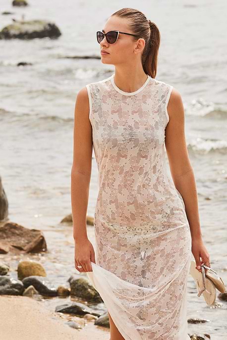 The Best Travel Dress. Woman Showing the Front Profile of a Marloe Camo Mesh Dress in White.
