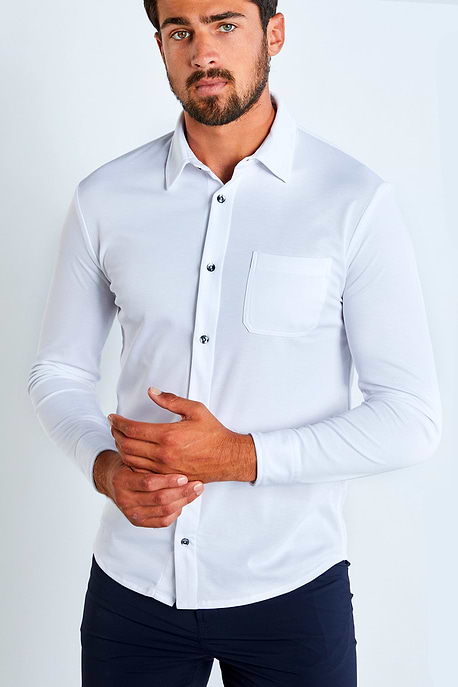 The Best Travel Top. Man Showing the Front Profile of a Men's Nick Top in White.