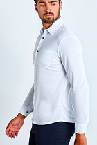 The Best Travel Top. Man Showing the Side Profile of a Men's Nick Top in White.