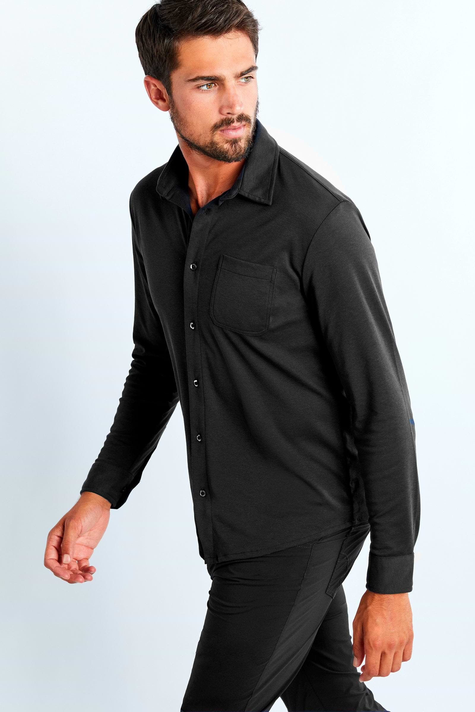 The Best Travel Top. Man Showing the Side Profile of a Men's Nick Top in Black.