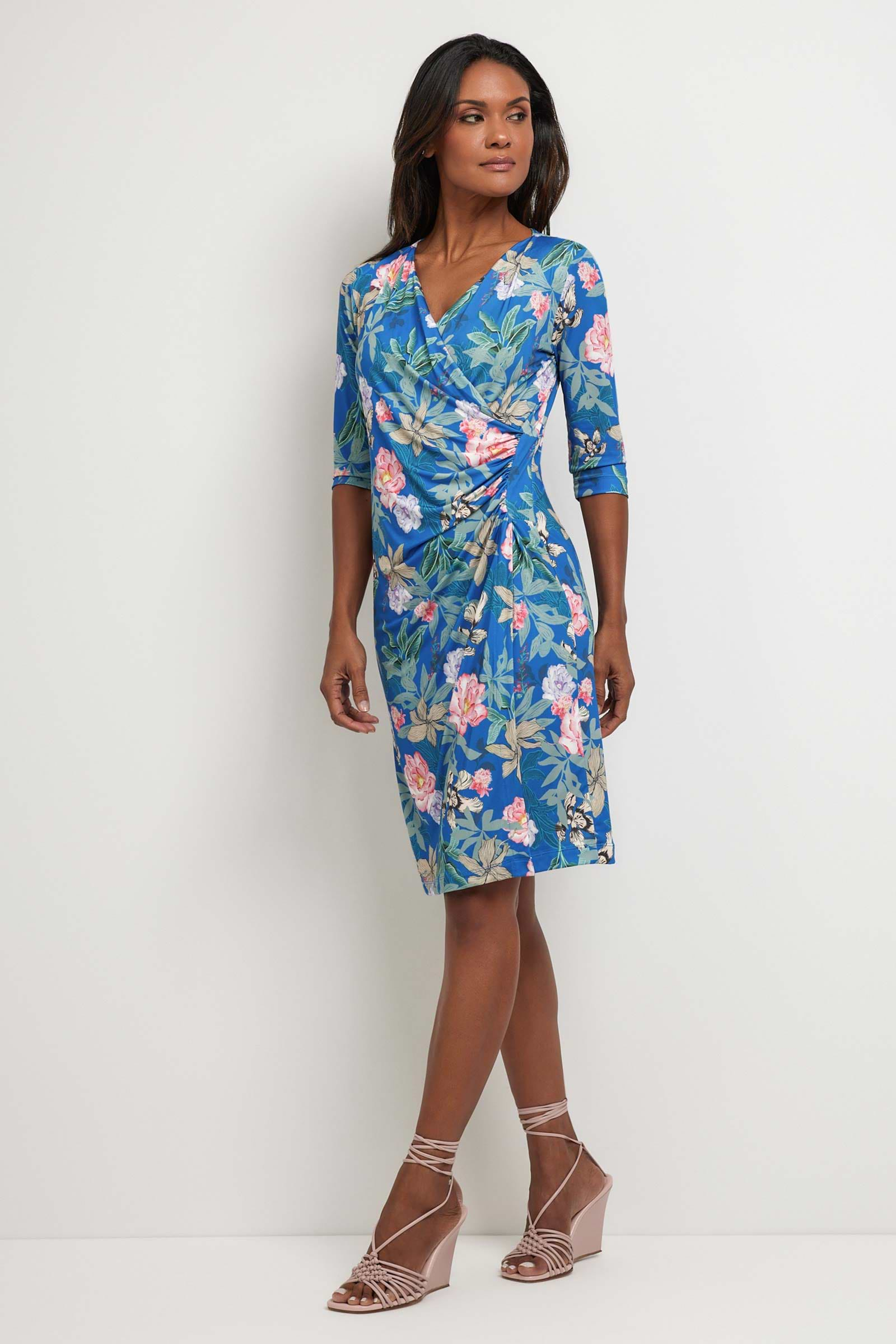 The Best Travel Dress. Woman Showing the Side Profile of a Marine Printed Dress in Persian Floral.