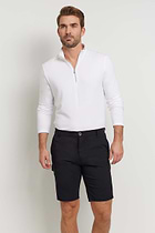 The Best Travel Top. Man Showing the Front Profile of a Men's Charlie Top in White.