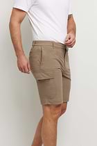 The Best Travel Shorts. Man Showing the Side Profile of a Men's Randy Short in Khaki.