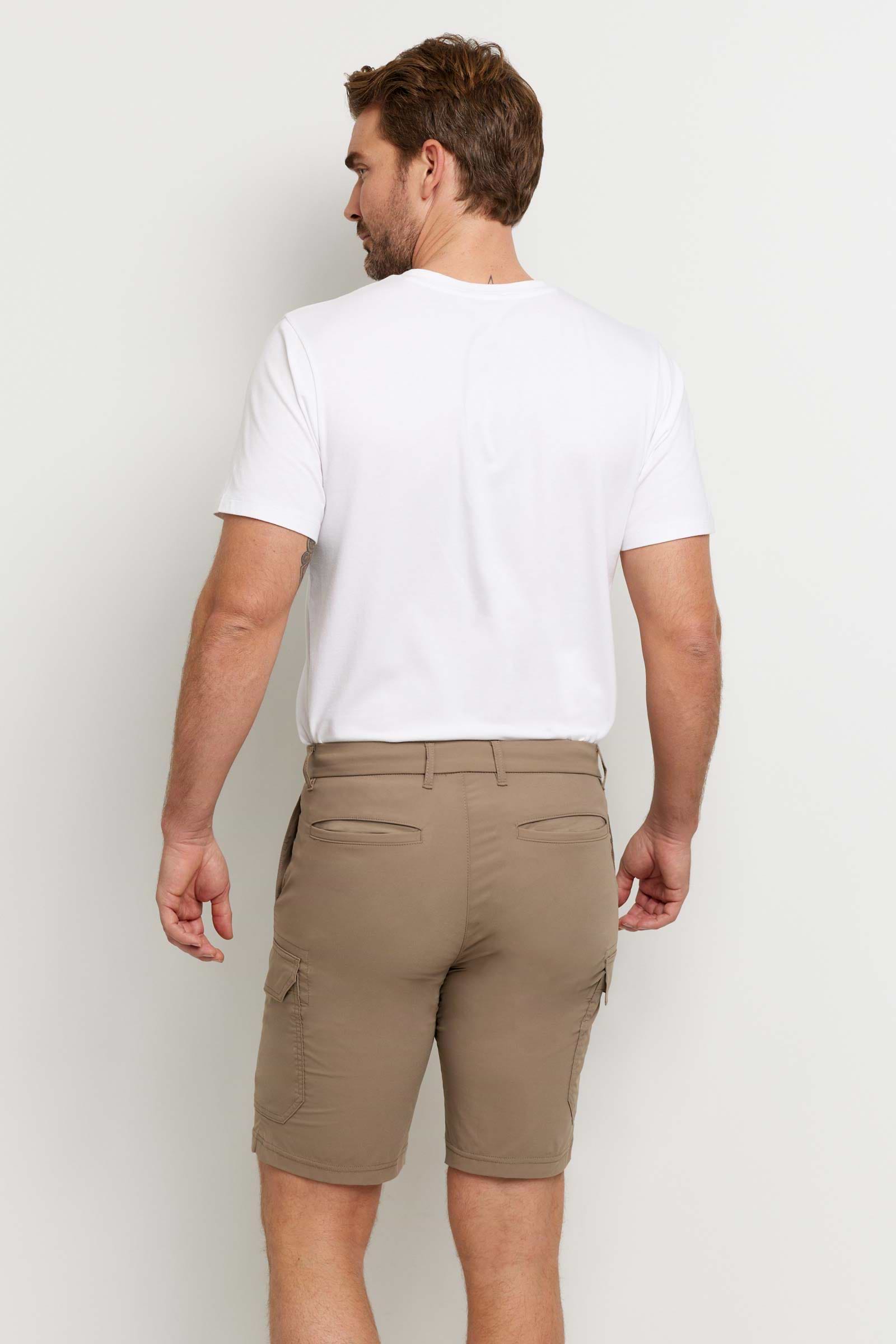 The Best Travel Shorts. Man Showing the Back Profile of a Men's Randy Short in Khaki.