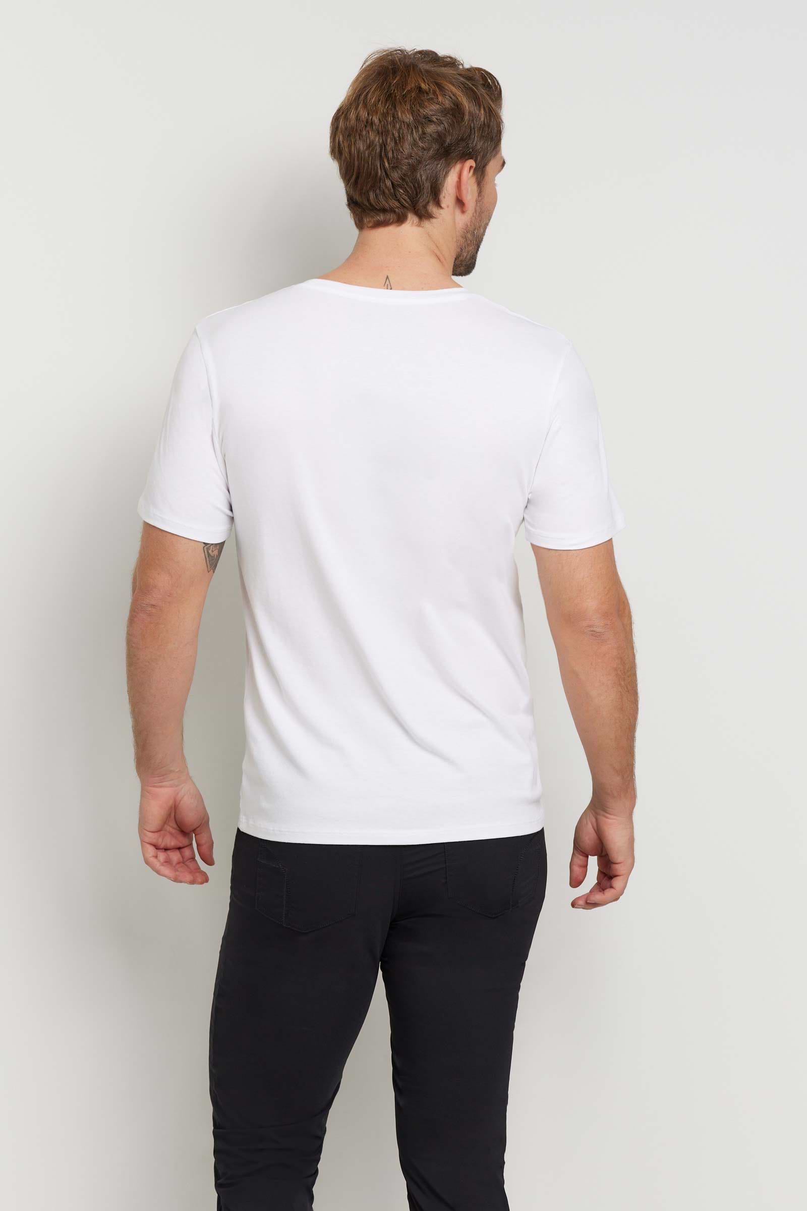 The Best Travel Top. Man Showing the Back Profile of a Men's Scott Top in White.