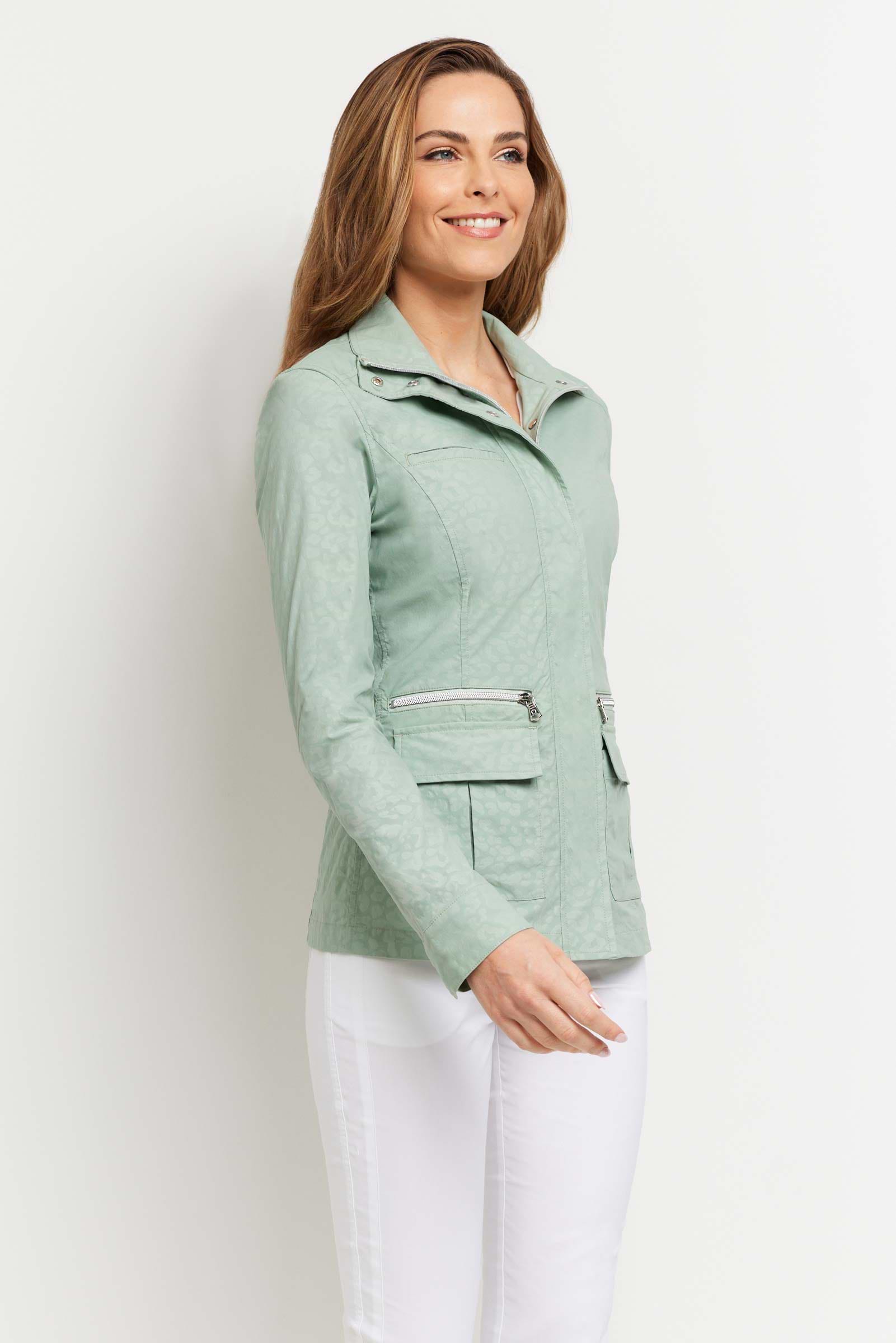The Best Travel Jacket. Woman Showing the Side Profile of an Embossed Kenya Jacket in Cheetah Sage.