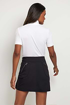 The Best Travel Top. Woman Showing the Back Profile of a Serena Top in White.