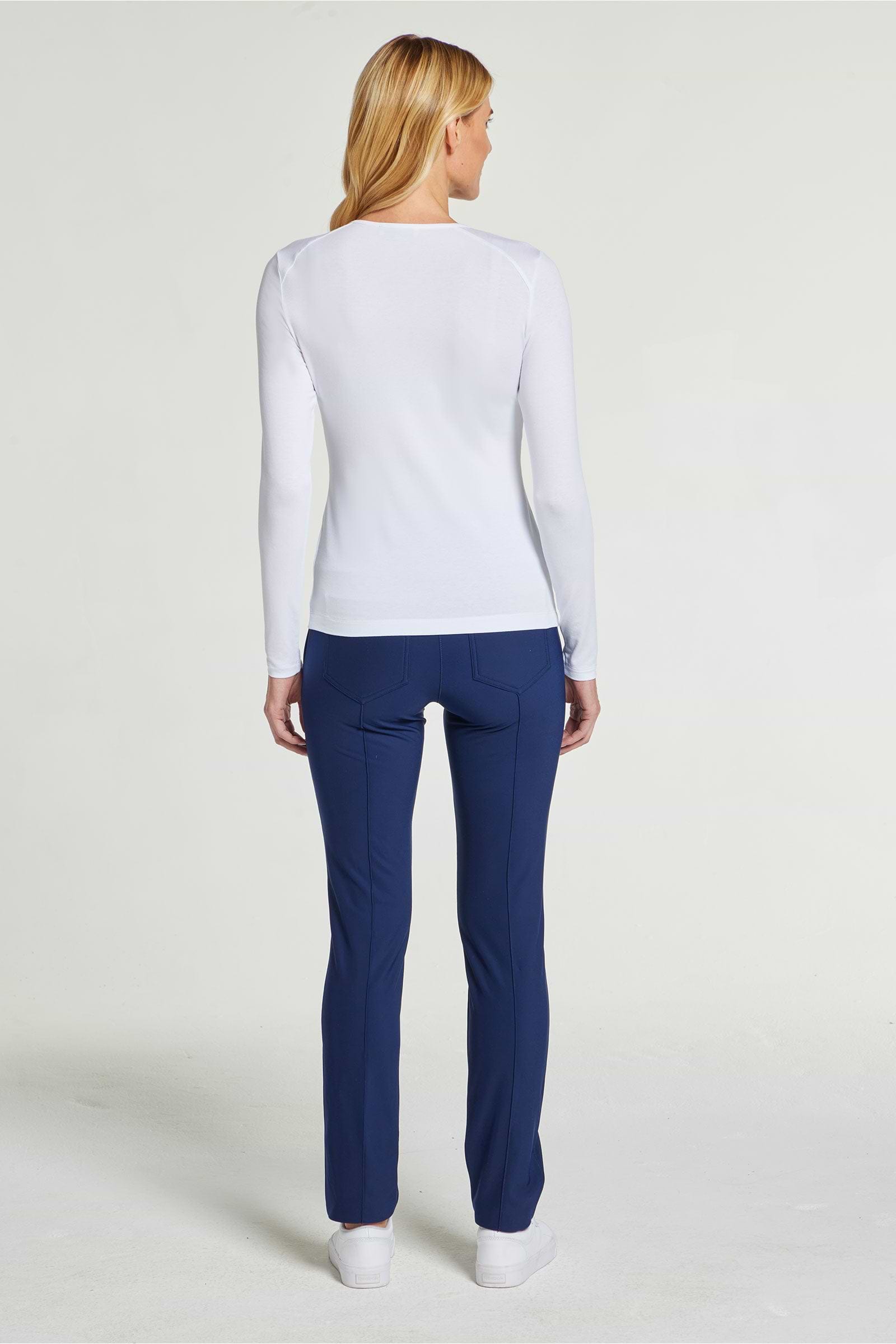 The Best Travel Top. Woman Showing the Back Profile of a Tony Pima Cotton Long-Sleeve Top in White