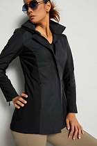 The Best Travel Jacket. Woman Showing the Front Profile of a Travel City Slick Jacket in Black