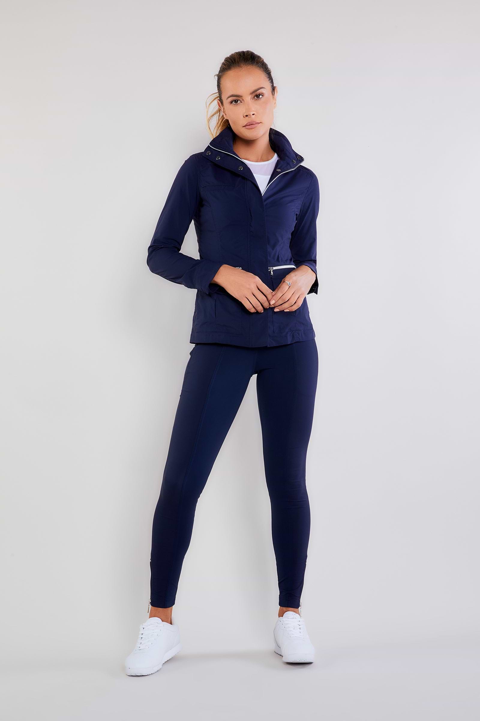 The Best Travel Pants. Woman Showing the Front Profile of the Allie Pant in Navy