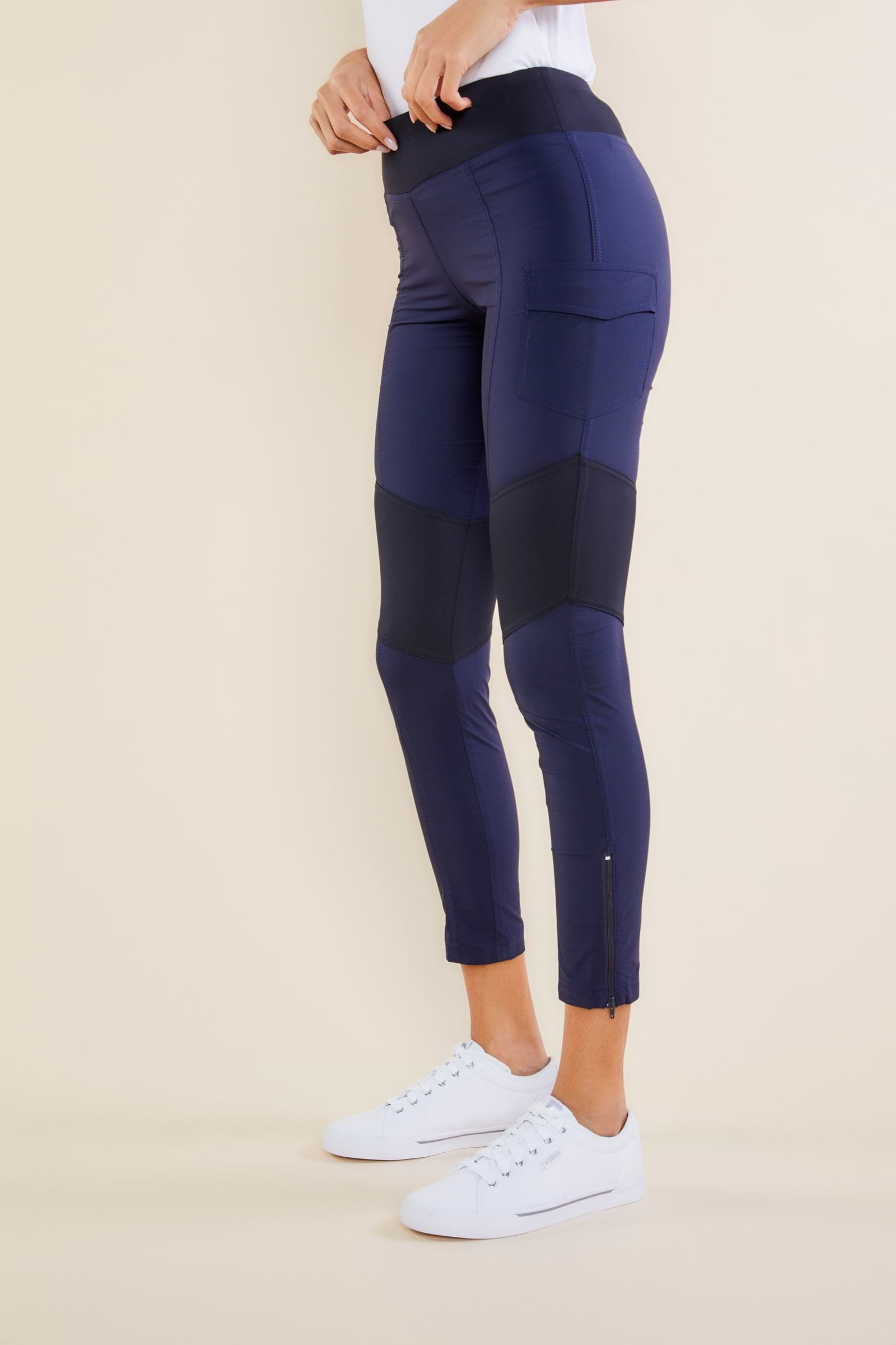 The Best Travel Pants. Side Profile of the Andrea Contrast-Panel Legging in Navy with Black