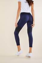 The Best Travel Pants. Back Profile of the Andrea Contrast-Panel Legging in Navy with Black