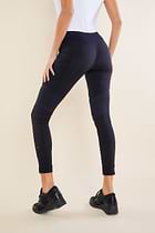The Best Travel Pants. Back Profile of the Andrea Contrast-Panel Legging in Black